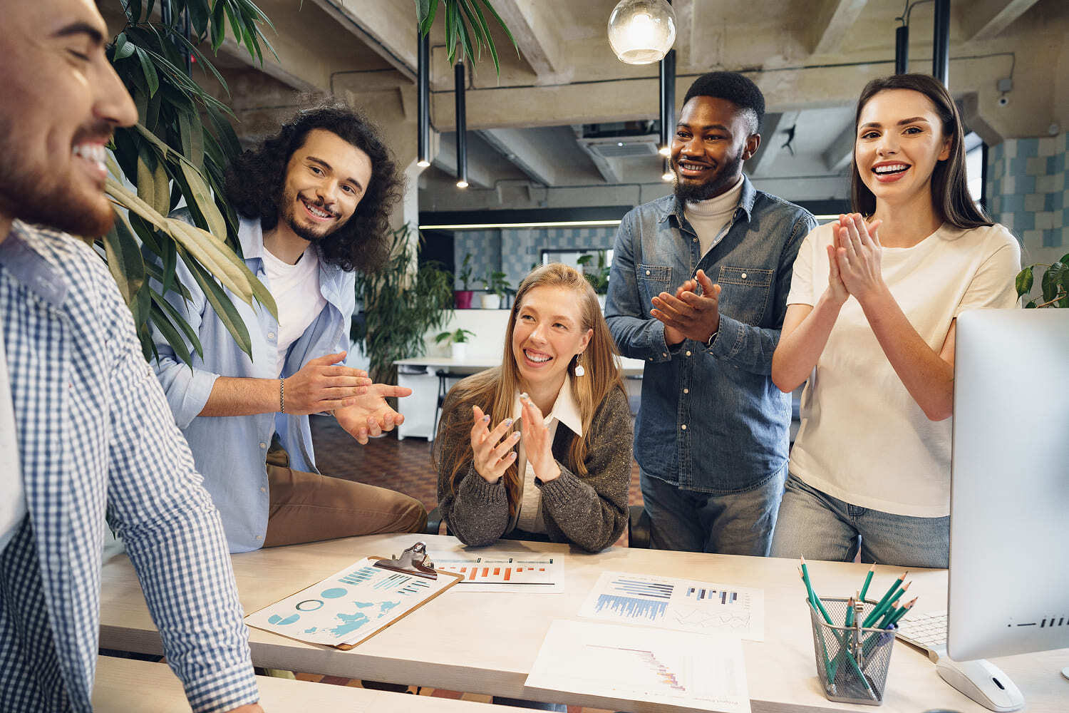 team-diverse-coworkers-modern-office-discuss-their-project-together 1 (1)